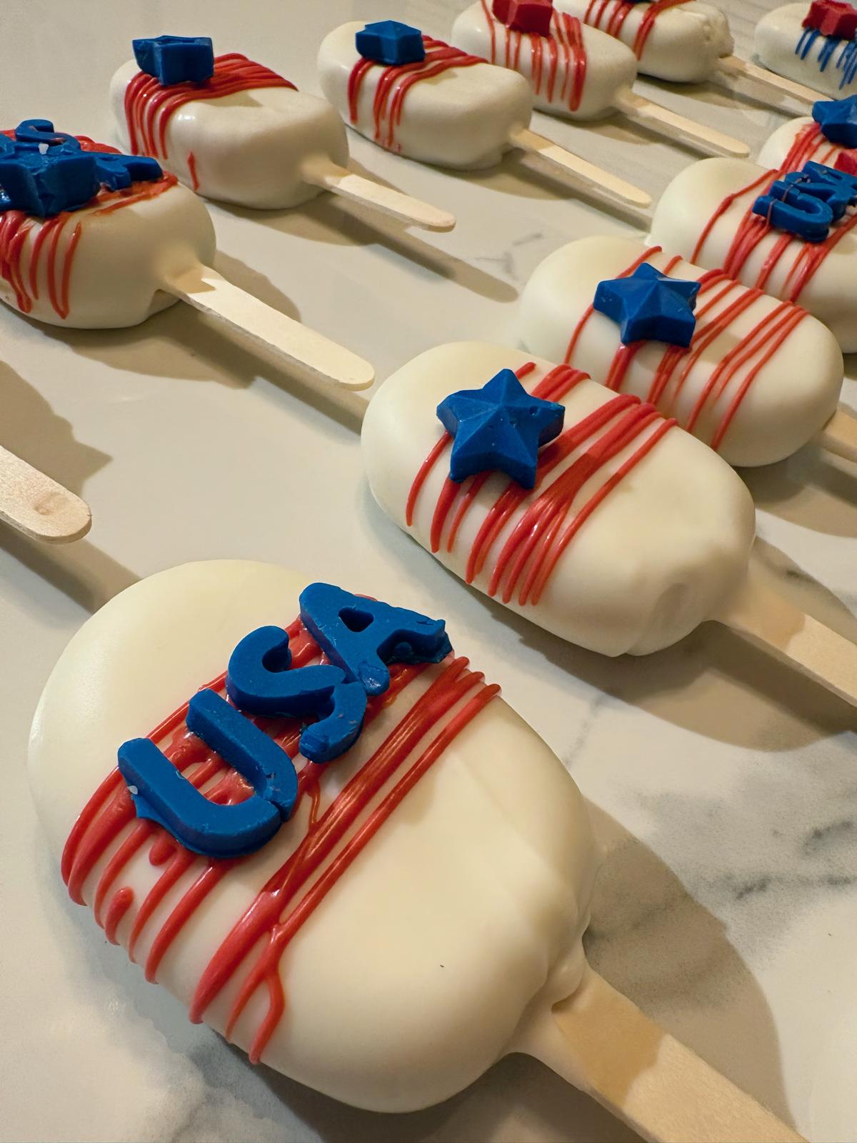 Close-up of patriotic cakesicles with stars and stripes
